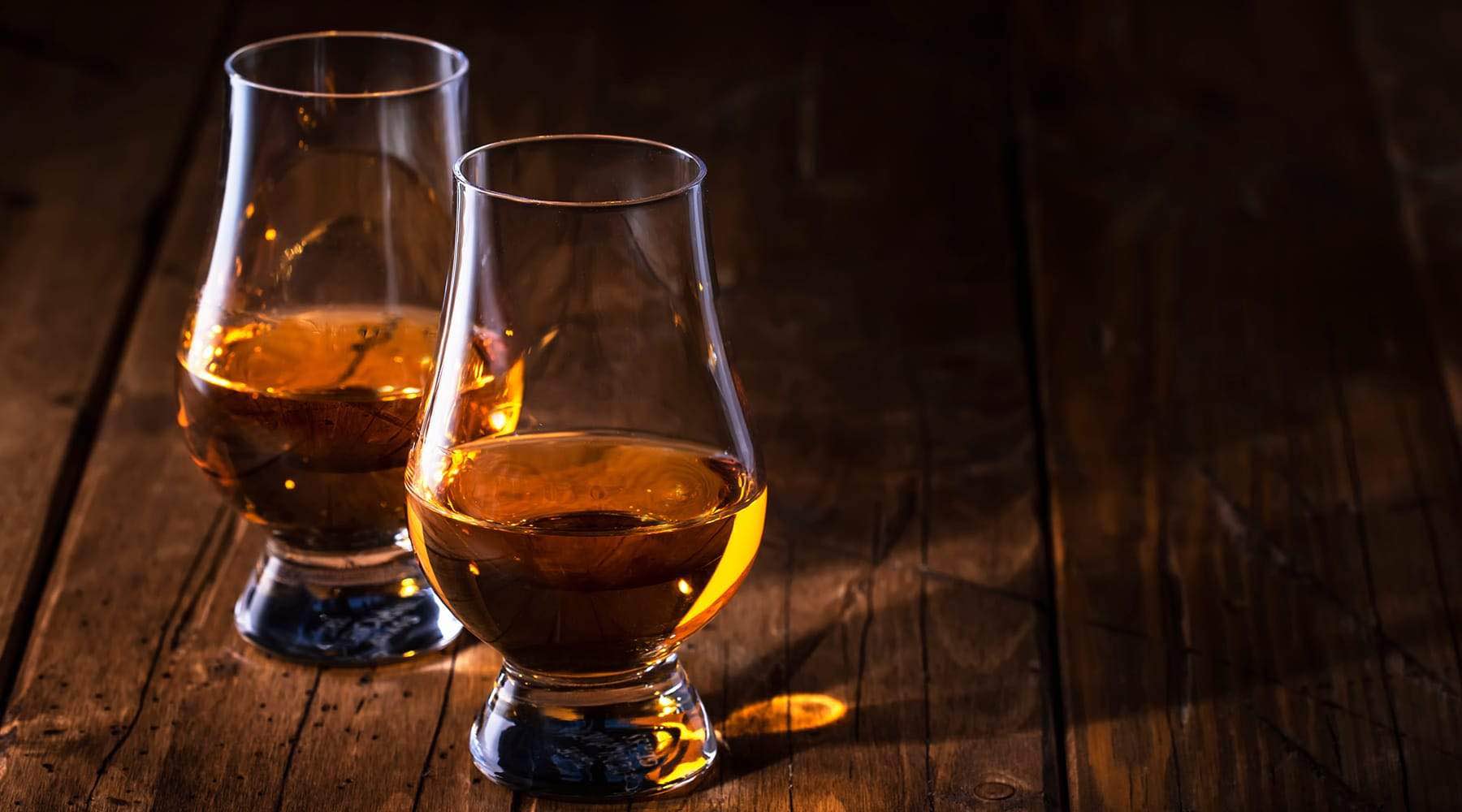 What key ingredients is whisky or whiskey made from?